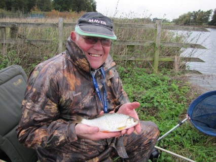 Geoff with his first fish a quality roach